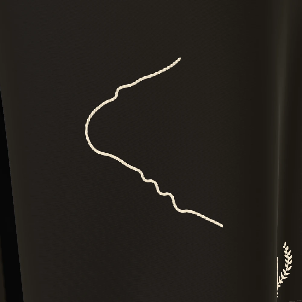 Embroidered course on the left thigh